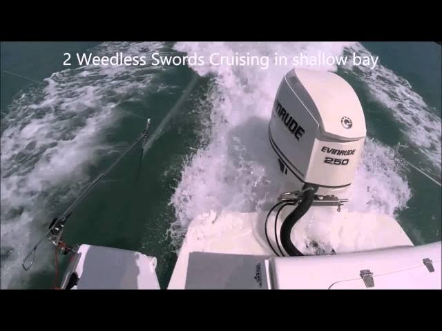 Boat Cruising In A Shallow Bay With An Evinrude 250 Engine